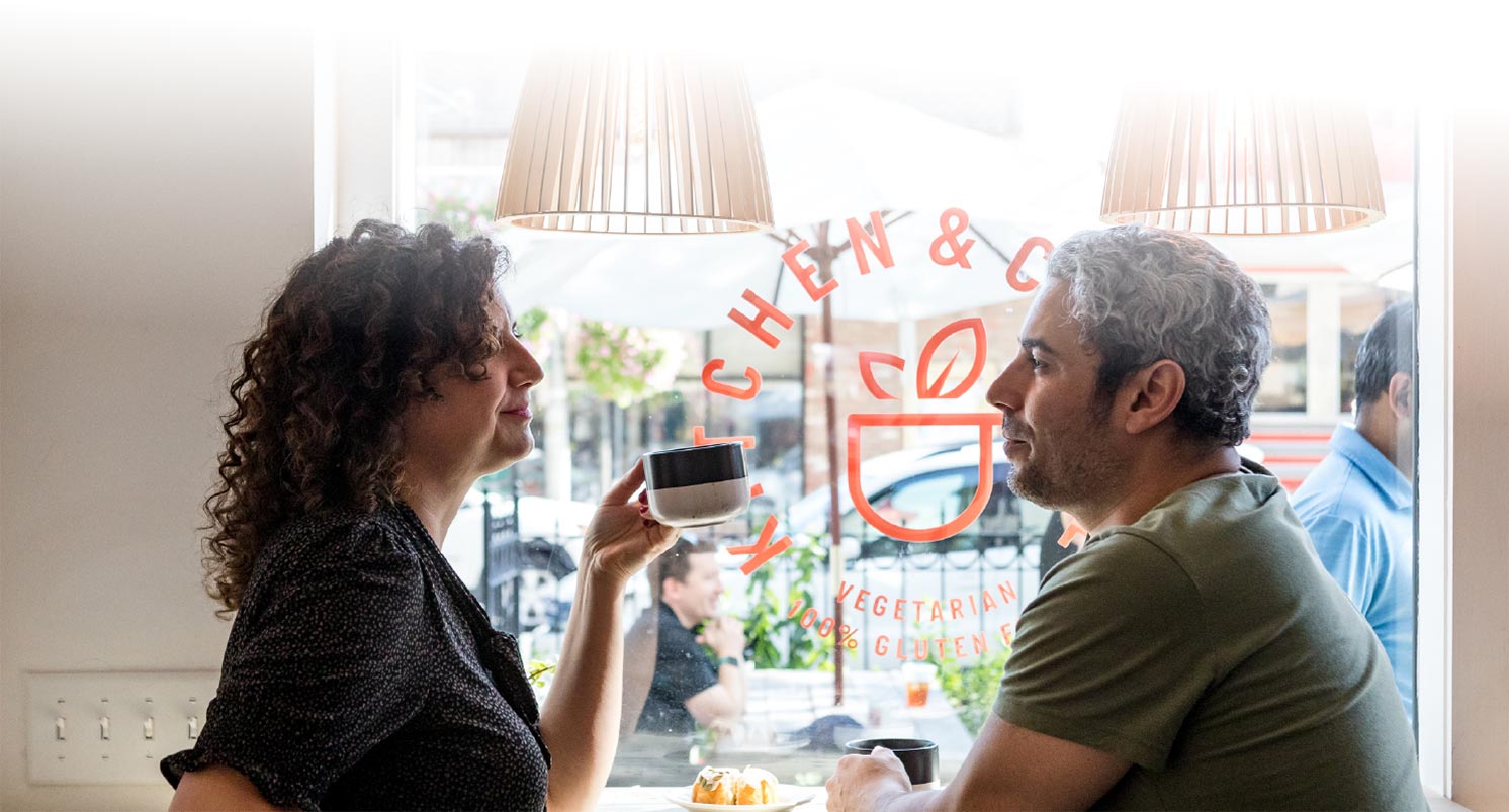 couple in window table at restaurant